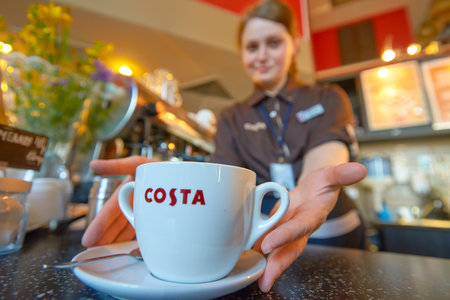 MOSCOW, RUSSIA - JUNE 26, 2016: close up shot of cup at Costa Coffee. Costa Coffee is a British multinational coffeehouse company. It is the second largest coffeehouse chain in the world behind Starbucks.のeditorial素材