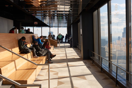 CHICAGO, IL - CIRCA MARCH, 2016: visitors at John Hancock Center's observatory. The John Hancock Center is a supertall skyscraper at 875 North Michigan Avenue, Chicago.のeditorial素材