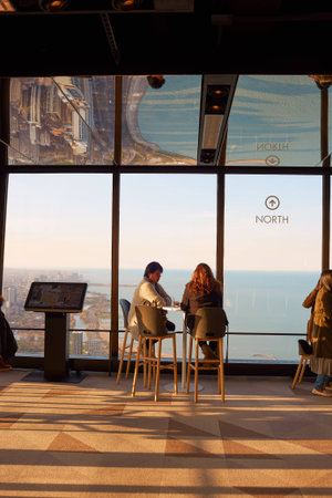 CHICAGO, IL - CIRCA MARCH, 2016: visitors at John Hancock Center's observatory. The John Hancock Center is a supertall skyscraper at 875 North Michigan Avenue, Chicago.のeditorial素材