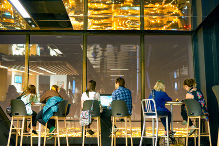 CHICAGO, IL - CIRCA MARCH, 2016: visitors at John Hancock Center's observatory. The John Hancock Center is a supertall skyscraper at 875 North Michigan Avenue, Chicago.のeditorial素材