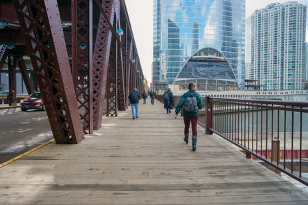 CHICAGO, IL - CIRCA MARCH, 2016: people across bridge in Chicago. Chicago is the third most populous city in the United States.のeditorial素材