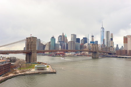 NEW YORK - CIRCA MARCH, 2016: Brooklyn Bridge in the daytime. The Brooklyn Bridge is connects the...