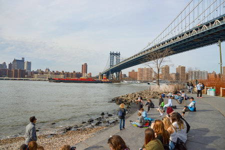 NEW YORK - CIRCA MARCH, 2016: Manhattan Bridge in the daytime. The Manhattan Bridge is a suspension bridge that crosses the East River in New York Cityのeditorial素材