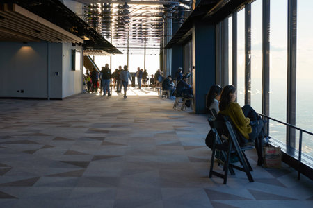 CHICAGO, IL - CIRCA MARCH, 2016: visitors at John Hancock Center's observatory. The John Hancock Center is a supertall skyscraper at 875 North Michigan Avenue, Chicago.のeditorial素材