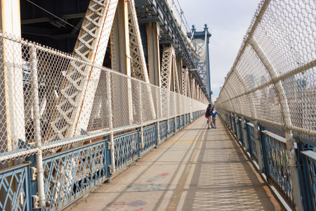NEW YORK - CIRCA MARCH, 2016: Manhattan Bridge Pedestrian Walkway. The Manhattan Bridge is a suspension bridge that crosses the East River in New York Cityのeditorial素材
