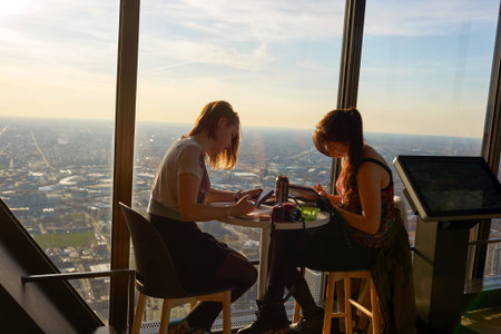CHICAGO, IL - CIRCA MARCH, 2016: visitors at John Hancock Center's observatory. The John Hancock Center is a supertall skyscraper at 875 North Michigan Avenue, Chicago.のeditorial素材