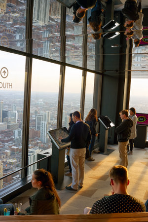 CHICAGO, IL - CIRCA MARCH, 2016: visitors at John Hancock Center's observatory. The John Hancock Center is a supertall skyscraper at 875 North Michigan Avenue, Chicago.のeditorial素材