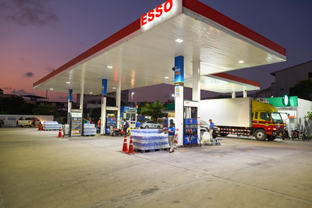 PATTAYA, THAILAND - CIRCA FEBRUARY, 2016:  Esso station at twilight. Esso is a trade name for ExxonMobil and its related companies.のeditorial素材