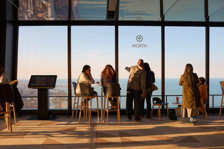 CHICAGO, IL - CIRCA MARCH, 2016: visitors at John Hancock Center's observatory. The John Hancock Center is a supertall skyscraper at 875 North Michigan Avenue, Chicago.のeditorial素材