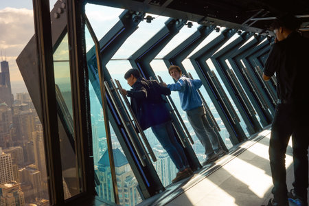 CHICAGO, IL - CIRCA MARCH, 2016: the TILT platform at John Hancock Center's observatory. The John Hancock Center is a supertall skyscraper at 875 North Michigan Avenue, Chicago.のeditorial素材
