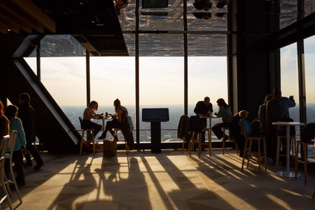 CHICAGO, IL - CIRCA MARCH, 2016: visitors at John Hancock Center's observatory. The John Hancock Center is a supertall skyscraper at 875 North Michigan Avenue, Chicago.のeditorial素材