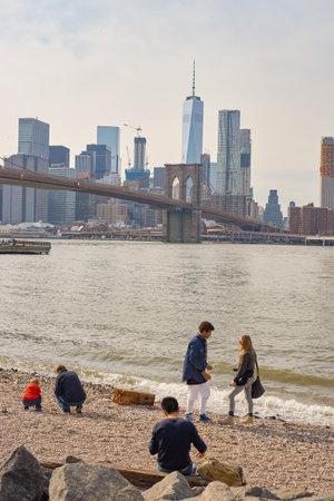 NEW YORK - CIRCA MARCH, 2016: Brooklyn Bridge in the daytime. The Brooklyn Bridge is connects the boroughs of Manhattan and Brooklyn by spanning the East River.のeditorial素材