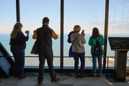 CHICAGO, IL - CIRCA MARCH, 2016: visitors at John Hancock Center's observatory. The John Hancock Center is a supertall skyscraper at 875 North Michigan Avenue, Chicago.のeditorial素材
