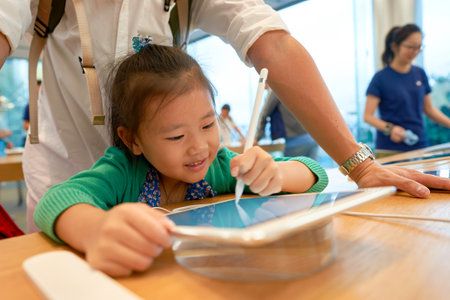 HONG KONG - CIRCA SEPTEMBER, 2016: inside of Apple store. Apple Store is a chain of retail stores owned and operated by Apple Inc., dealing with computers and consumer electronics.のeditorial素材