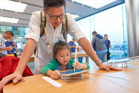 HONG KONG - CIRCA SEPTEMBER, 2016: inside of Apple store. Apple Store is a chain of retail stores owned and operated by Apple Inc., dealing with computers and consumer electronics.のeditorial素材