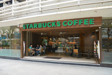 KUALA LUMPUR, MALAYSIA - CIRCA MAY, 2016:Starbucks in Kuala Lumpur. Starbucks Corporation is an American coffee company and coffeehouse chain.のeditorial素材