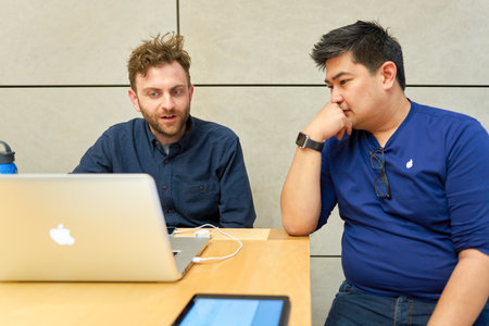 CHICAGO, IL - MARCH 24, 2016: inside of Apple store. Apple Store is a chain of retail stores owned and operated by Apple Inc., dealing with computers and consumer electronics.のeditorial素材