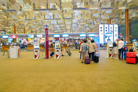 SINGAPORE - CIRCA AUGUST, 2016: self check-in kiosks at Changi Aiport. Changi Airport is the primary civilian airport for Singapore.のeditorial素材