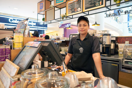 KUALA LUMPUR, MALAYSIA - MAY 09, 2016: indoor portrait of a woman at Suria KLCC. Suria KLCC is located in the Kuala Lumpur City Centre district. It is in the vicinity of the landmark the Petronas Towers.のeditorial素材