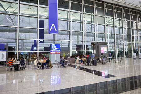 HONG KONG - CIRCA DECEMBER, 2014: inside of Hong Kong International Airport. Hong Kong International Airport is the main airport in Hong Kong.のeditorial素材