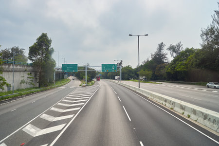 HONG KONG - MAY 12, 2016: view from upper deck of double-decker bus. Hong Kong is an autonomous territory on the southern coast of China at the Pearl River Estuary and the South China Seaのeditorial素材