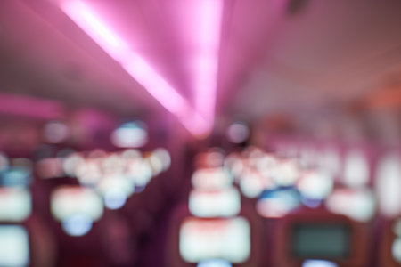Defocused shot of lower deck in modern double-deck, wide-body, four-engine jet airliner.のeditorial素材