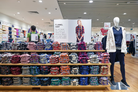 SINGAPORE - CIRCA NOVEMBER, 2015: Uniqlo store at Singapore Changi Airport. Changi Airport  is the...