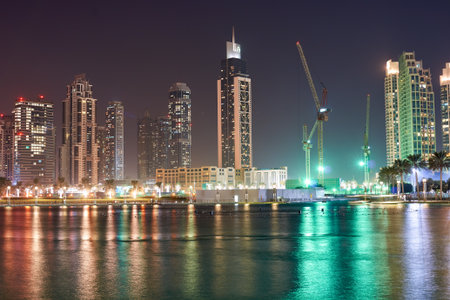 DUBAI, UAE - OCTOBER 15, 2014: view of Burj Khalifa Lake in Dubai at night. Dubai is the most populous city in the United Arab Emiratesのeditorial素材