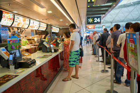 HONG KONG - CIRCA SEPTEMBER, 2016: McDonald's in Hong Kong International Airport. McDonald's is the...