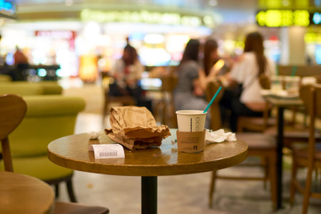 SINGAPORE- SEPTEMBER 12, 2016: Starbacks at Changi Airport in Singapore. Starbucks Corporation is an American coffee company and coffeehouse chain.のeditorial素材