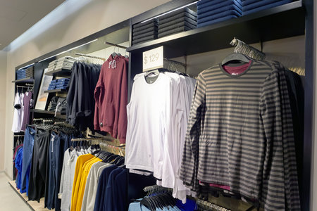 HONG KONG - CIRCA JANUARY, 2016: H & M store in Hong Kong. H and M known for its fast-fashion clothing for men, women, teenagers and children.のeditorial素材