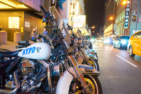 NEW YORK - CIRCA MARCH, 2016: police motorcycles of the New York Police Department at night. NYPD is the largest municipal police force in the United States.のeditorial素材
