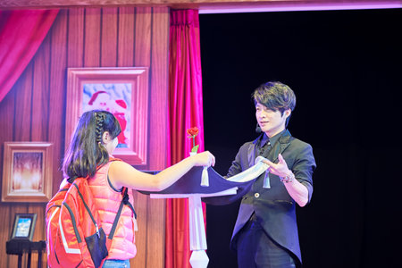HONG KONG - DECEMBER 24, 2015: Magic performance in Hong Kong Airport. Hong Kong International...