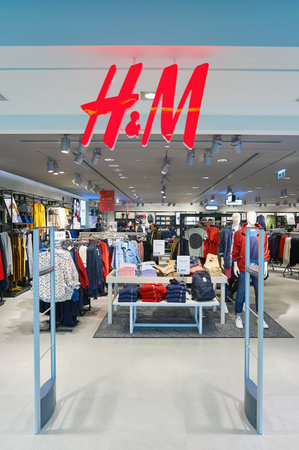HONG KONG - CIRCA JANUARY, 2016: H & M store in Hong Kong. H and M known for its fast-fashion clothing for men, women, teenagers and children.のeditorial素材
