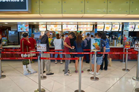 HONG KONG - CIRCA SEPTEMBER, 2016: McDonald's in Hong Kong International Airport. McDonald's is the...