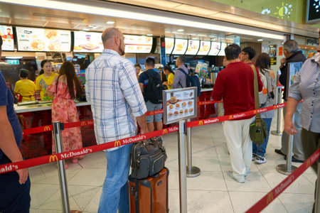 HONG KONG - CIRCA SEPTEMBER, 2016: McDonald's in Hong Kong International Airport. McDonald's is the...