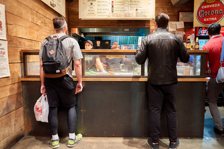 NEW YORK - MARCH 18, 2016: inside of Tres Carnes - 688 6th Ave, New York. Tres Carnes is a barbeque eatery offering authentic Texas Smoked Mexican Fare.のeditorial素材