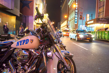 NEW YORK - CIRCA MARCH, 2016: police motorcycles of the New York Police Department at night. NYPD is the largest municipal police force in the United States.のeditorial素材
