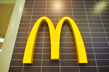 HONG KONG - CIRCA JANUARY, 2016: close up shot of McDonald's logo on a wall. McDonald's is the...