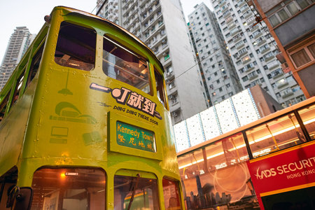 HONG KONG - OCTOBER 25, 2015: double-decker tramway in Hong Kong. Hong Kong is an autonomous territory on the southern coast of China at the Pearl River Estuary and the South China Sea.のeditorial素材