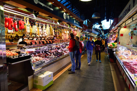 BARCELONA, SPAIN - NOVEMBER 20, 2015: inside La Boqueria in Barcelona. The Mercat de Sant Josep de la Boqueria is a large public market and one of the city's foremost tourist landmark in Barcelona.のeditorial素材