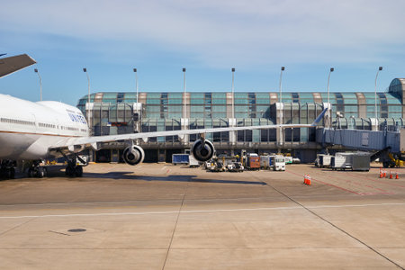 CHICAGO, IL - APRIL 05, 2016: passenger jet aircraft at O'Hare Airport. Chicago O'Hare International Airport is an international airport located on the Far Northwest Side of Chicago, Illinois.のeditorial素材