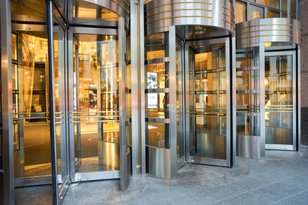 CHICAGO, IL - 04 APRIL, 2016: revolving doors at 900 North Michigan, Chicago. 900 North Michigan is a skyscraper in Chicago, Illinois, United States.のeditorial素材