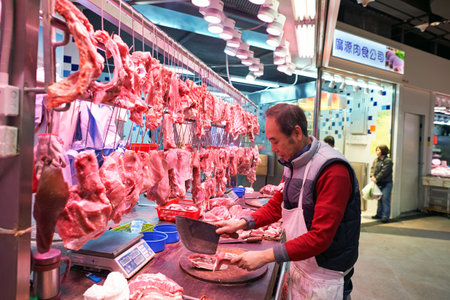 HONG KONG  - 26 JANUARY, 2016: a meat stall in Hong Kong. Hong Kong is an autonomous territory on the Pearl River Delta in East Asia.のeditorial素材