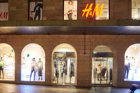 GENEVA, SWITZERLAND - NOVEMBER 18, 2015: a store in Geneva at night. Geneva is the second most populous city in Switzerland, after Zurich.のeditorial素材