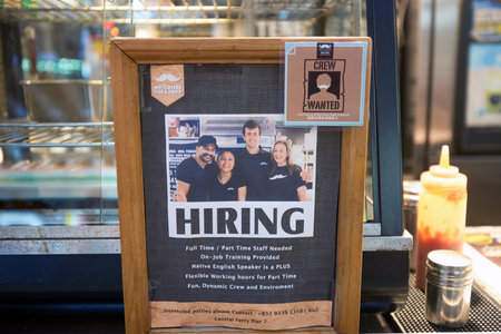 HONG KONG - CIRCA JANUARY, 2016: hiring notice at White Beard Fish n Chips in Hong Kong. Hong Kong, is an autonomous territory on the southern coast of China at the Pearl River Estuary and the South China Sea.のeditorial素材