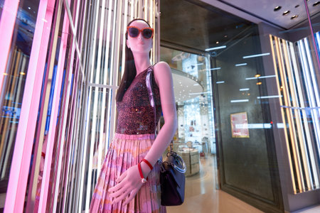 HONG KONG - JANUARY 27, 2016: Dior boutique in Hong Kong at night. Christian Dior SE, commonly known...