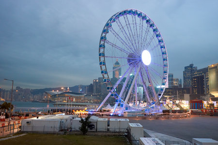 HONG KONG - CIRCA JANUARY, 2016: Ferris Wheel in Hong Kong at twilight. The Hong Kong Observation Wheel is located in Central, Hong Kong.のeditorial素材