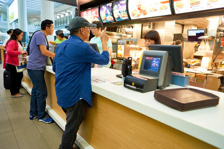 HONG KONG - CIRCA NOVEMBER, 2016: counter service in a McDonald's restaurant in Hong Kong....