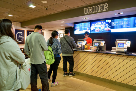 HONG KONG - CIRCA NOVEMBER, 2016: counter service in a McDonald's restaurant in Hong Kong....